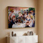 Gold floater framed canvas of Luncheon of the Boating Party (Le Déjeuner des canotiers), 1880-1881 by Pierre-Auguste Renoir, featuring a lively gathering of men and women eating and socializing at outdoor table above a console cabinet in a minimalist entryway.