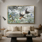 Common Swifts, 1886 by Bruno Liljefors as a gold floater framed canvas featuring a flock of birds in flight soaring across open sky above landscape, displayed above a sofa in a modern living room.