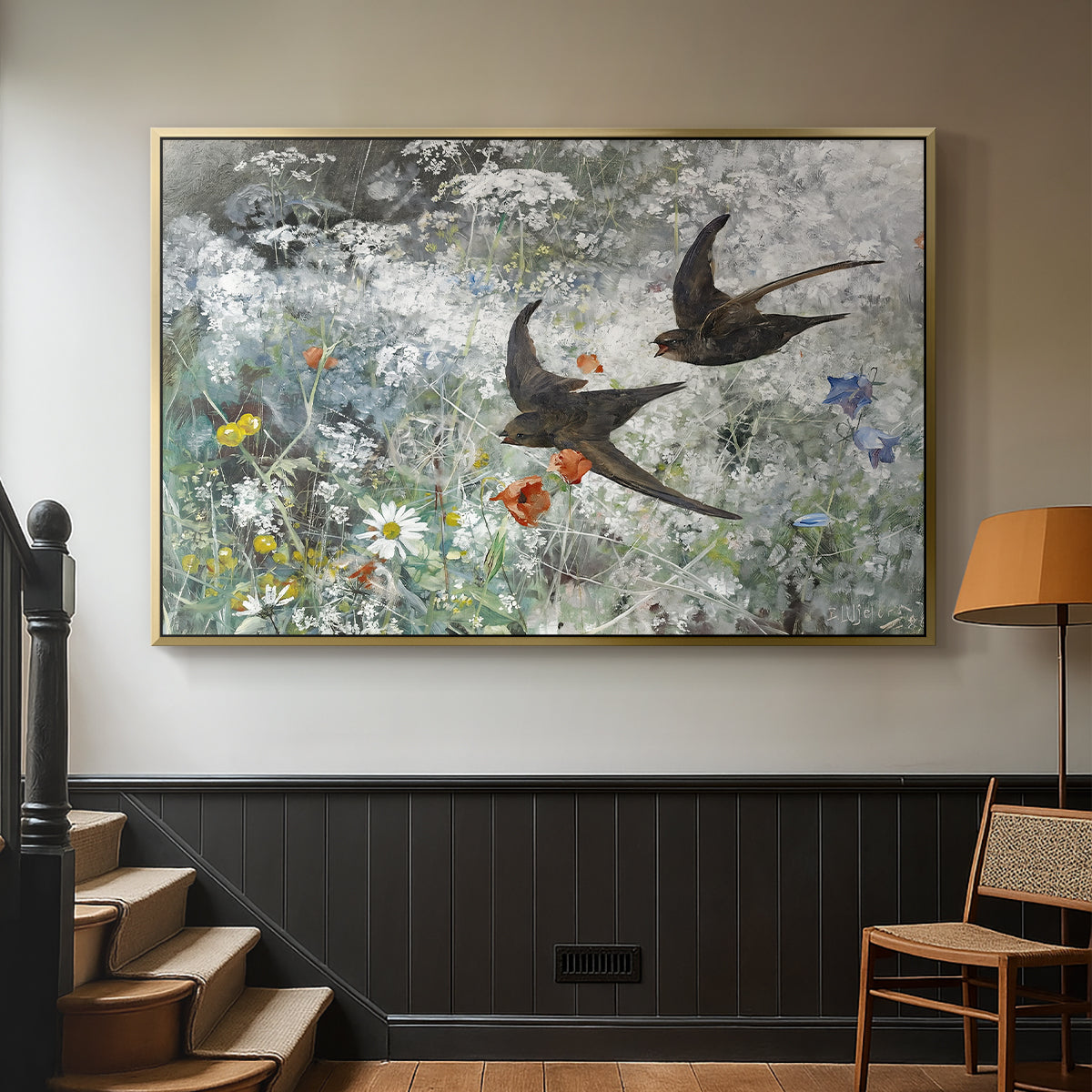 Gold floater framed canvas featuring an impressionist wildlife scene capturing birds in motion, displayed in a hallway near a staircase.