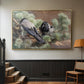 Gold floater framed canvas featuring a wildlife painting of dark birds against muted landscape, displayed in a hallway near a staircase.