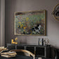 Cat on a Flowery Meadow, 1887 by Bruno Liljefors in a gold floater framed canvas featuring an animal scene of cat hidden in lush meadow vegetation, displayed above a desk in a dark home office interior.