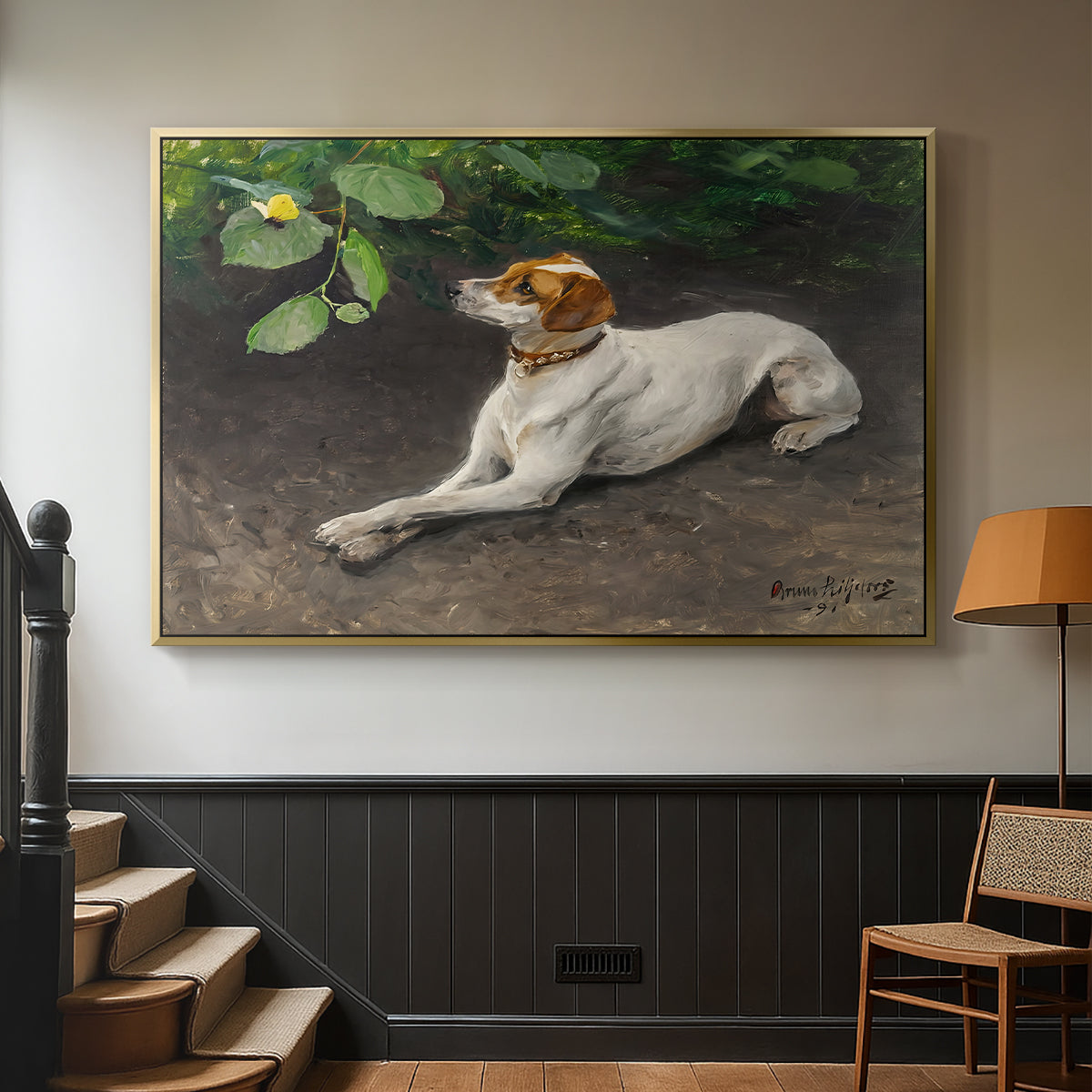 Gold floater framed canvas featuring a calm scene of dog reclining in open landscape, displayed in a hallway near a staircase.