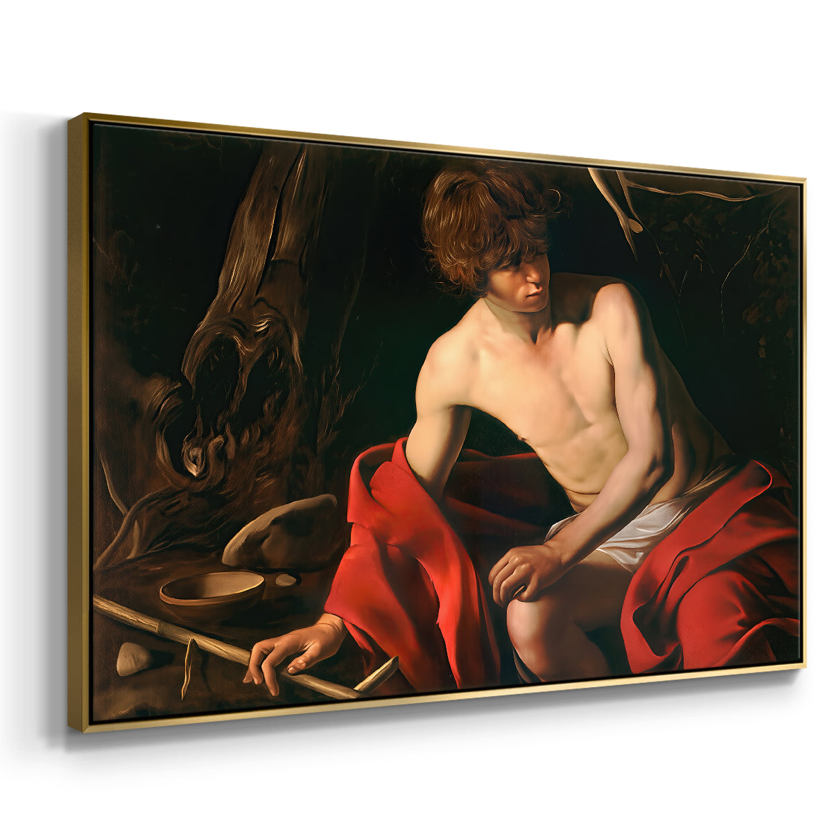 Angled view of Saint John the Baptist in the Wilderness, c. 1603-1604 by Caravaggio in a gold floater framed canvas.
