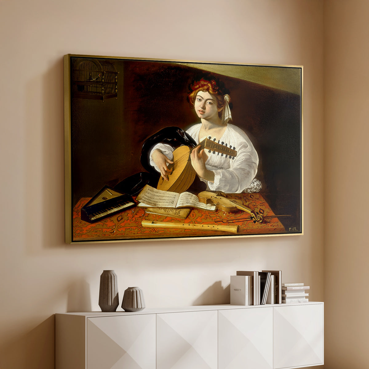 Gold floater framed canvas of The Lute Player (Wildenstein Version), c. 1596 by Caravaggio, featuring a musician seated with lute and musical instruments on table above a console cabinet in a minimalist entryway.
