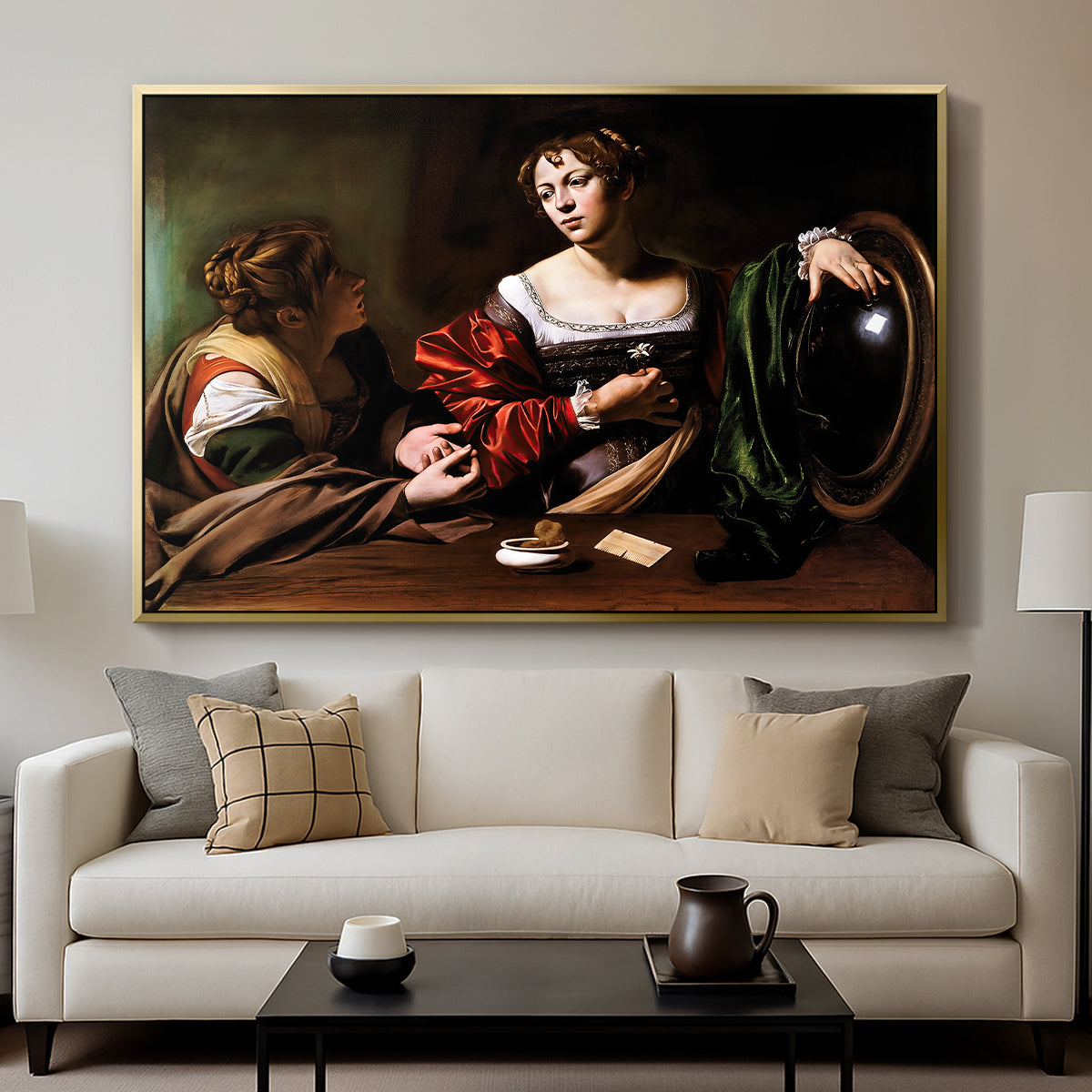 Martha and Mary Magdalene, c. 1598 by Caravaggio displayed in a gold floater framed canvas above a sofa in a clean living room.