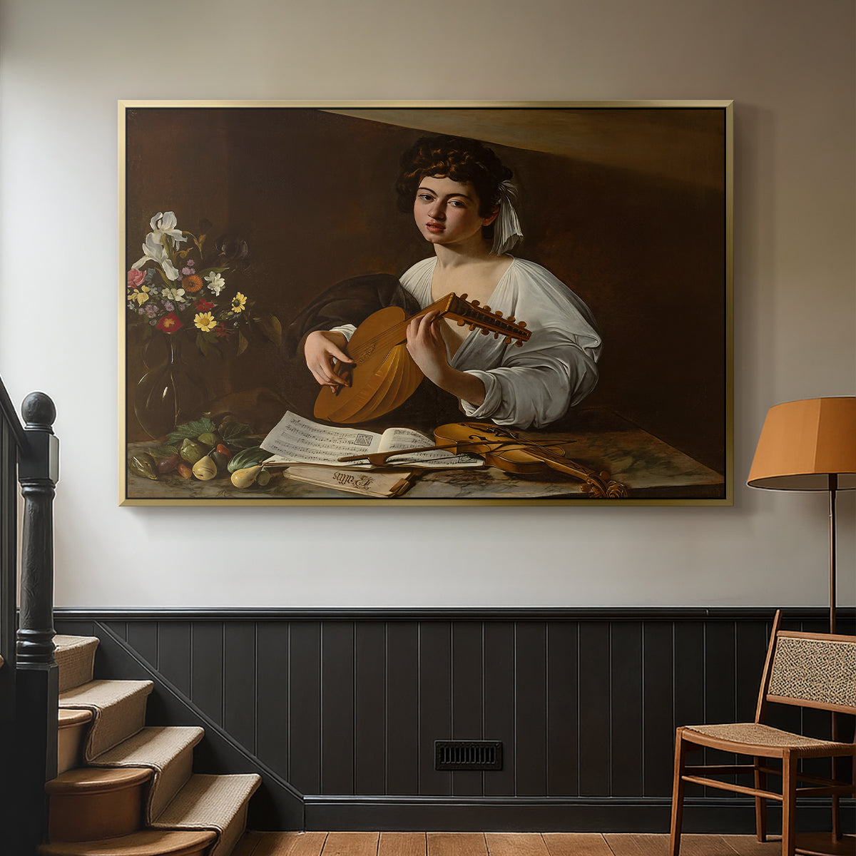 Gold floater framed canvas featuring a Baroque depiction of musician with detailed textures and lighting, displayed in a hallway near a staircase.