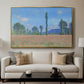 Poppy Field (Giverny), 1890-1891 by Claude Monet displayed in a gold floater framed canvas above a sofa in a clean living room.