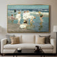 A Holiday, c. 1915 by Edward Henry Potthast displayed in a gold floater framed canvas above a sofa in a clean living room.