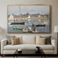 The Basin at Argenteuil, 1874 by Claude Monet displayed in a gold floater framed canvas above a sofa in a clean living room.