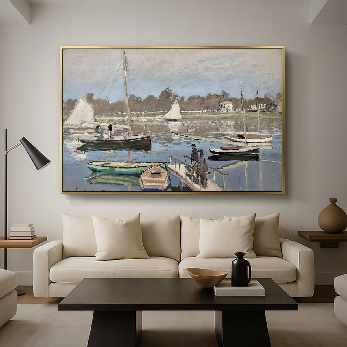 The Basin at Argenteuil, 1874 by Claude Monet as a gold floater framed canvas featuring sailboats gathered in calm basin with reflections on water, displayed above a sofa in a modern living room.