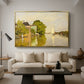 Houses on the Achterzaan, 1871 by Claude Monet as a gold floater framed canvas featuring colorful houses reflected in calm river surrounded by greenery, displayed above a sofa in a modern living room.