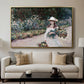 Young Girl in the Garden at Giverny, 1888 by Claude Monet displayed in a gold floater framed canvas above a sofa in a clean living room.