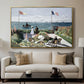 Garden at Sainte-Adresse, 1867 by Claude Monet displayed in a gold floater framed canvas above a sofa in a clean living room.