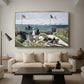 Garden at Sainte-Adresse, 1867 by Claude Monet as a gold floater framed canvas featuring a seaside garden with flowers, flags, and figures overlooking the water, displayed above a sofa in a modern living room.
