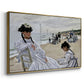 Angled view of On the Beach at Trouville, 1870 by Claude Monet in a gold floater framed canvas.