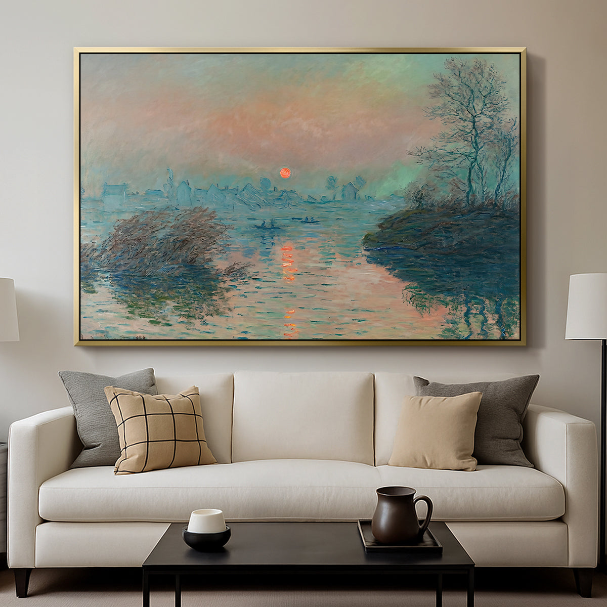 Sunset on the Seine at Lavacourt, Winter Effect, 1880 by Claude Monet displayed in a gold floater framed canvas above a sofa in a clean living room.