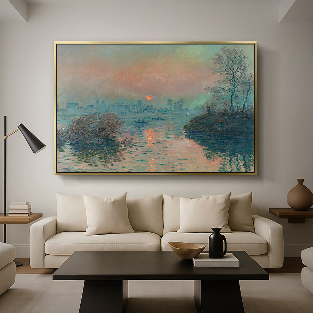 Sunset on the Seine at Lavacourt, Winter Effect, 1880 by Claude Monet as a gold floater framed canvas featuring a glowing sunset over snowy river landscape with soft reflections, displayed above a sofa in a modern living room.