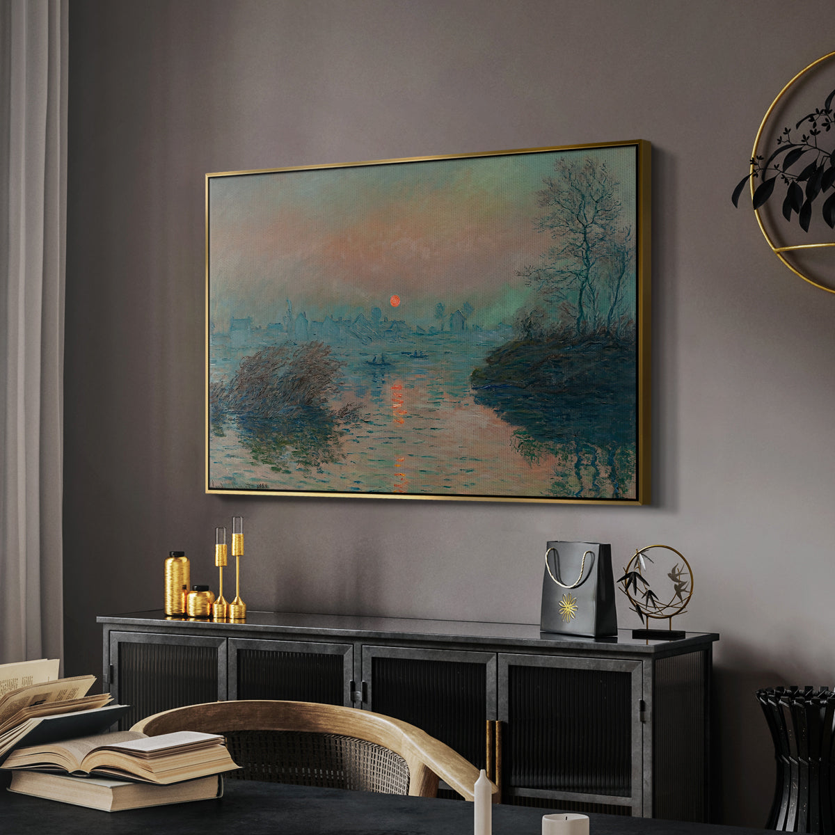Sunset on the Seine at Lavacourt, Winter Effect, 1880 by Claude Monet in a gold floater framed canvas featuring an impressionist view of river at sunset with snowy banks, displayed above a desk in a dark home office interior.