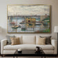 Bridge at Argenteuil on a Gray Day, c. 1876 by Claude Monet displayed in a gold floater framed canvas above a sofa in a clean living room.