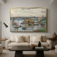 Bridge at Argenteuil on a Gray Day, c. 1876 by Claude Monet as a gold floater framed canvas featuring a bridge crossing river under gray sky with muted reflections, displayed above a sofa in a modern living room.