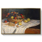 Still Life with Apples and Grapes, 1880 by Claude Monet in a gold floater framed canvas wall art display.