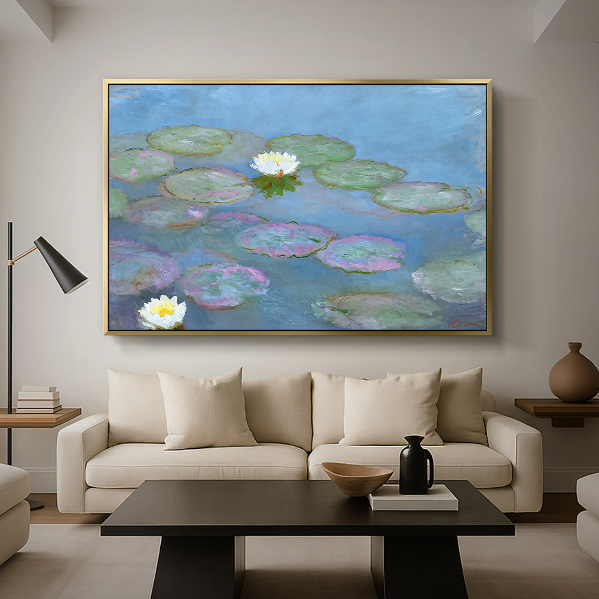 Water Lilies (Nymphéas), 1897-1899 by Claude Monet as a gold floater framed canvas featuring floating water lilies on pond with reflections of sky and foliage, displayed above a sofa in a modern living room.