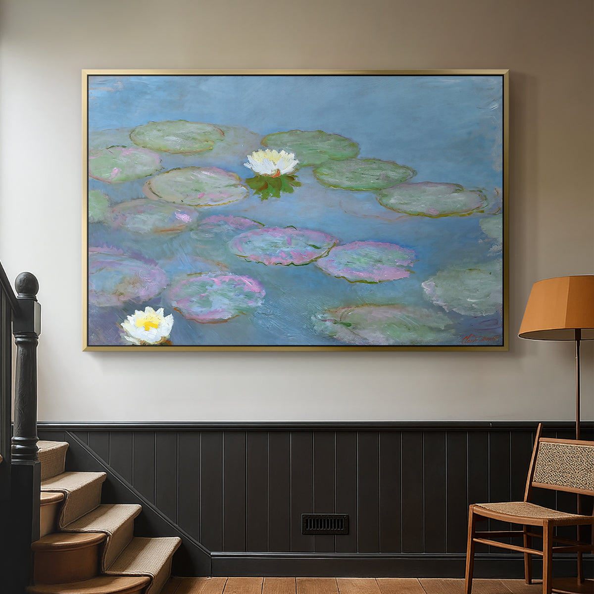 Gold floater framed canvas featuring a close-up of aquatic plants in still water, displayed in a hallway near a staircase.
