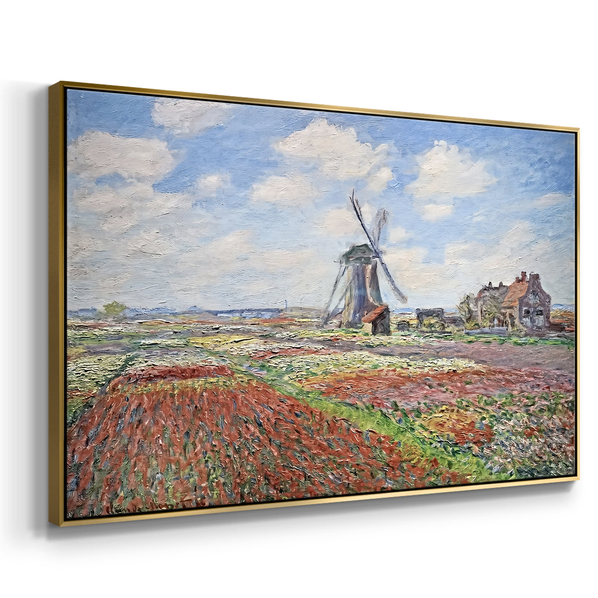 Angled view of Tulip Fields with the Rijnsburg Windmill, 1886 by Claude Monet in a gold floater framed canvas.