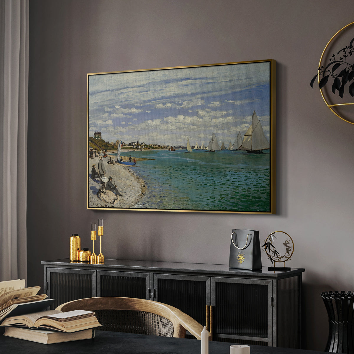 Regatta at Sainte-Adresse, 1867 by Claude Monet in a gold floater framed canvas featuring an impressionist coastal view with colorful sails and shoreline activity, displayed above a desk in a dark home office interior.