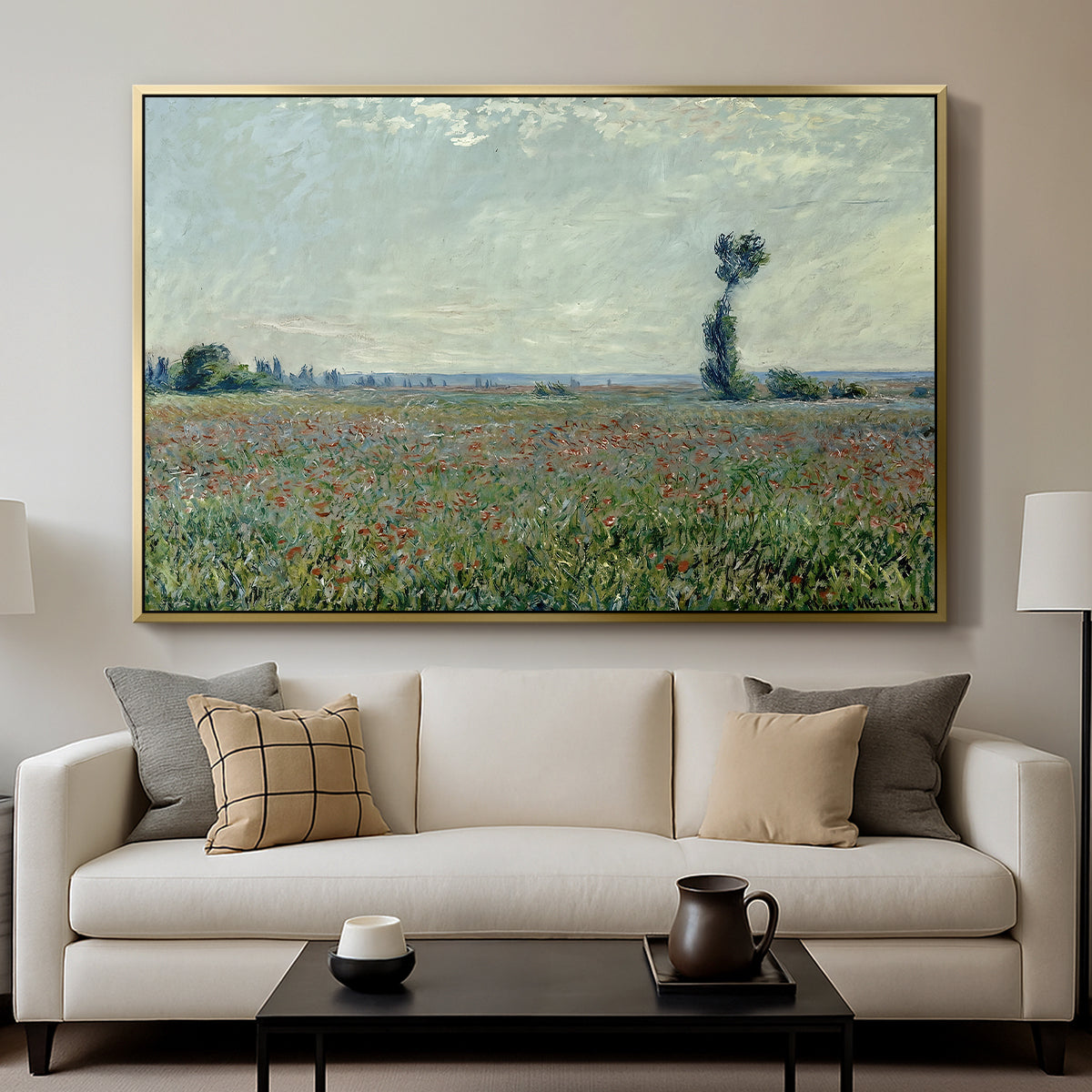 Poppy Field, 1881 by Claude Monet displayed in a gold floater framed canvas above a sofa in a clean living room.