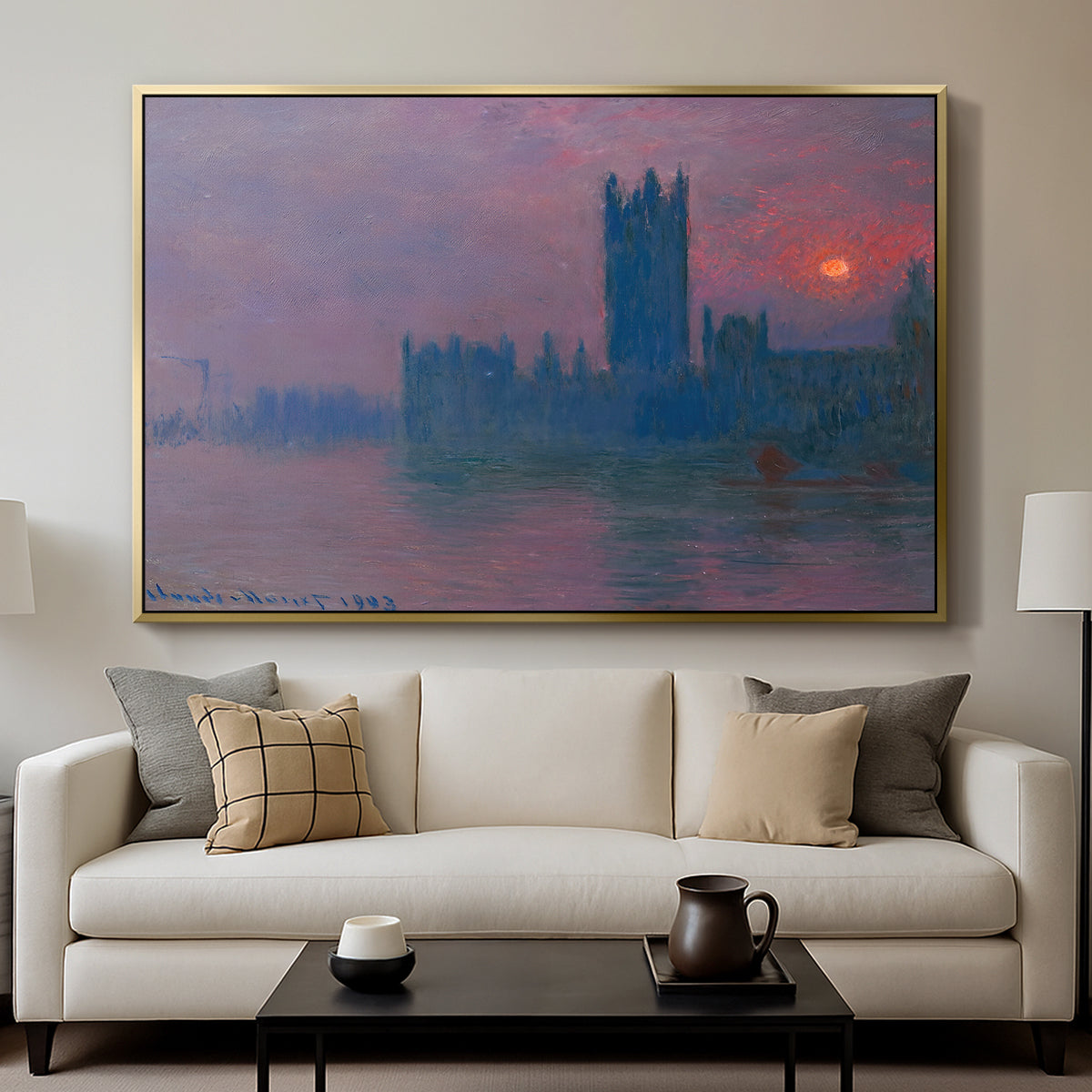 The Houses of Parliament, Sunset, 1903 by Claude Monet displayed in a gold floater framed canvas above a sofa in a clean living room.