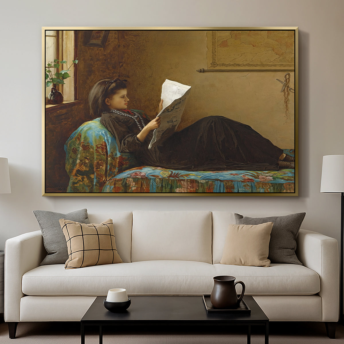 Interesting News, 1872 by Eastman Johnson displayed in a gold floater framed canvas above a sofa in a clean living room.