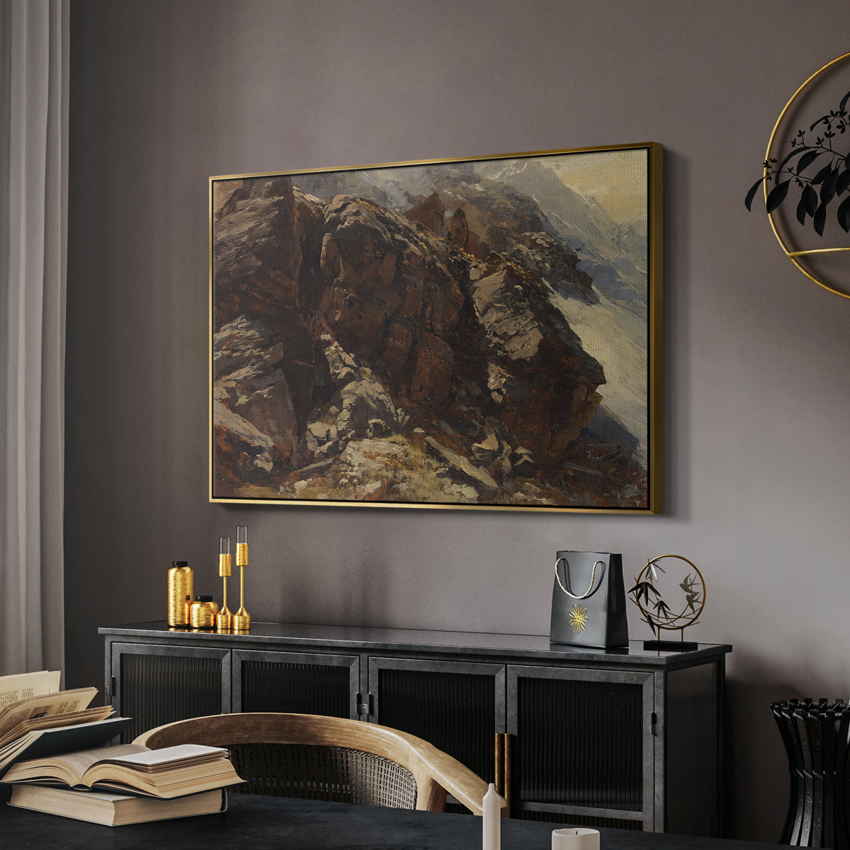 High Mountain Study, c. 1870 by Edward Theodore Compton in a gold floater framed canvas featuring a high-altitude scene with rocky formations and sparse vegetation, displayed above a desk in a dark home office interior.