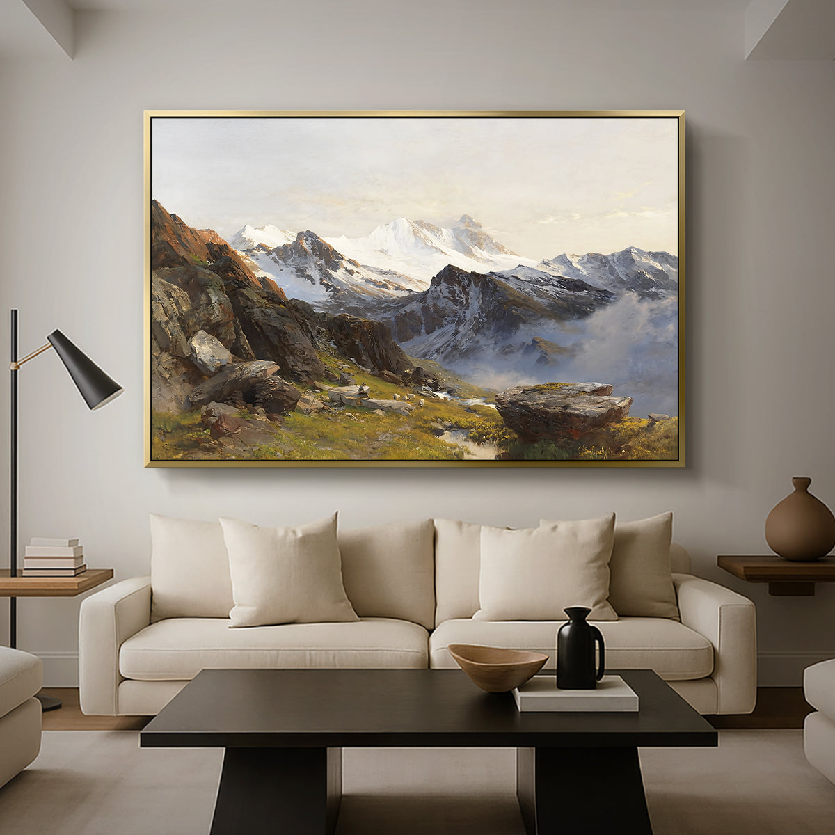 The Großglockner from the Prager Hut, 1890 by Edward Theodore Compton as a gold floater framed canvas featuring a view of Großglockner peak from alpine hut overlooking valley, displayed above a sofa in a modern living room.