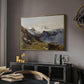 The Großglockner from the Prager Hut, 1890 by Edward Theodore Compton in a gold floater framed canvas featuring an alpine vista with towering peak and foreground terrain, displayed above a desk in a dark home office interior.