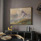 From the Dolomites, 1904 by Edward Theodore Compton in a gold floater framed canvas featuring an expansive landscape featuring iconic Dolomite peaks, displayed above a desk in a dark home office interior.