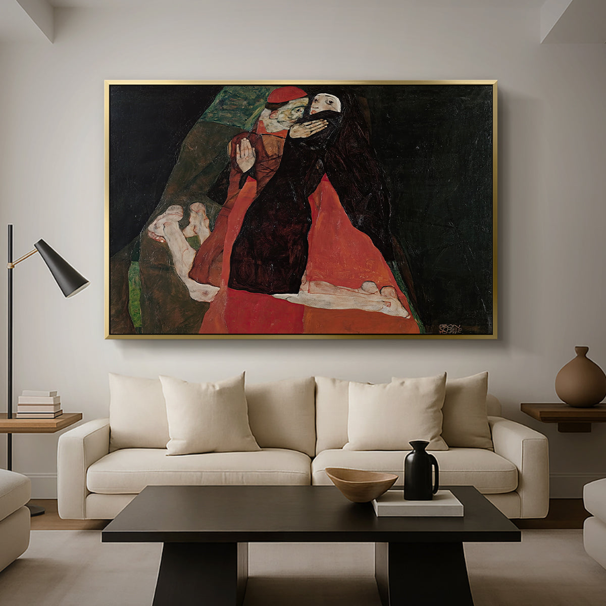 Cardinal and Nun (Caress), 1912 by Egon Schiele as a gold floater framed canvas featuring two figures embracing intimately in stylized expressionist composition, displayed above a sofa in a modern living room.