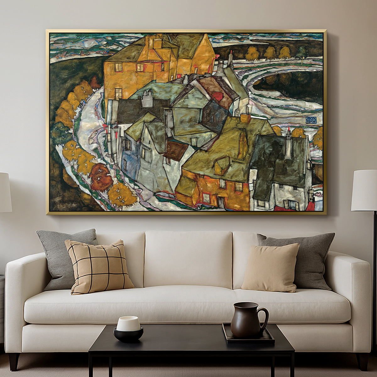Crescent of Houses II (Island Town), 1915 by Egon Schiele displayed in a gold floater framed canvas above a sofa in a clean living room.