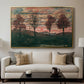 Four Trees, 1917 by Egon Schiele displayed in a gold floater framed canvas above a sofa in a clean living room.