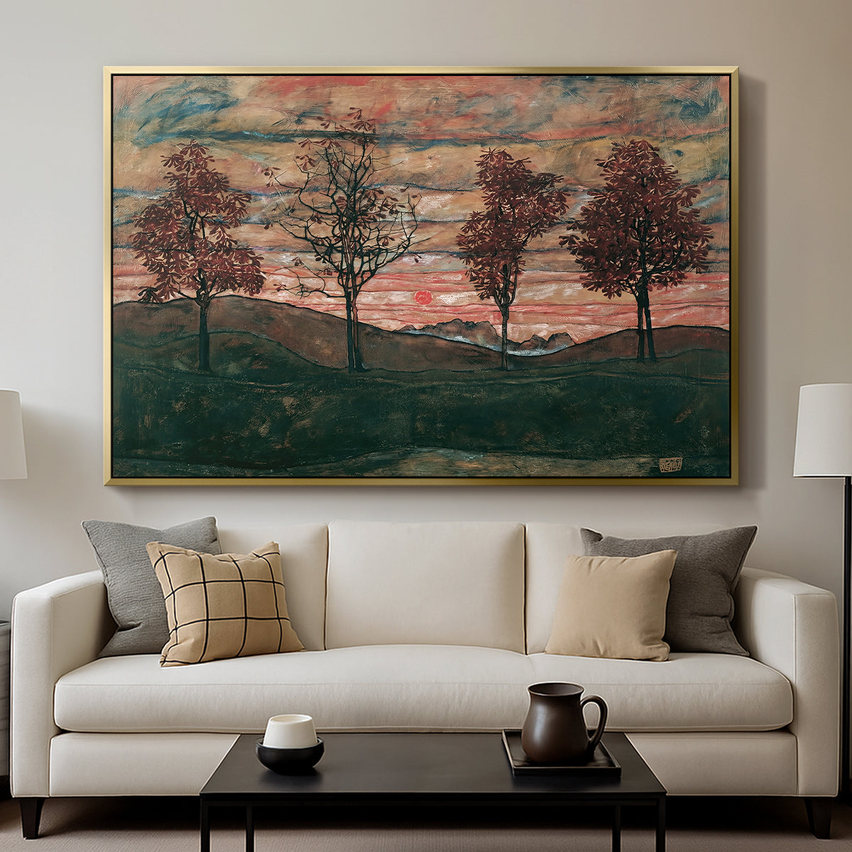 Four Trees, 1917 by Egon Schiele displayed in a gold floater framed canvas above a sofa in a clean living room.