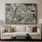 Mödling II, 1918 by Egon Schiele displayed in a gold floater framed canvas above a sofa in a clean living room.