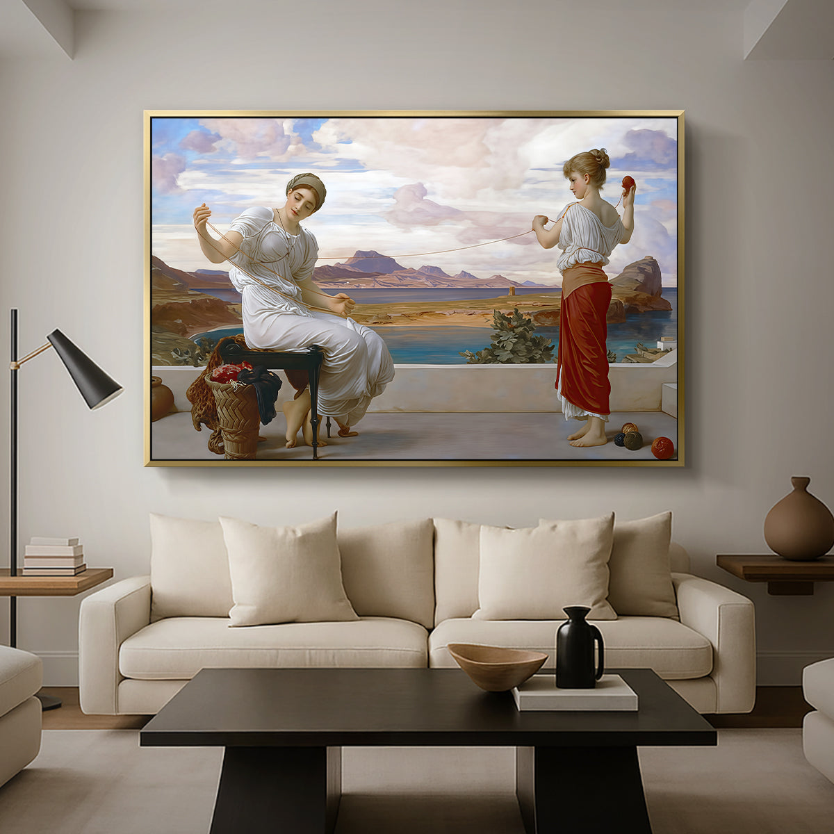 Winding the Skein, c. 1878 by Frederic Leighton as a gold floater framed canvas featuring a woman holding thread while another figure helps wind yarn in classical setting, displayed above a sofa in a modern living room.
