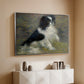 Silver floater framed canvas of Tama, the Japanese Dog, c. 1876 by Pierre-Auguste Renoir, featuring an impressionist painting of a dog wading through water with blurred background above a console cabinet in a minimalist entryway.