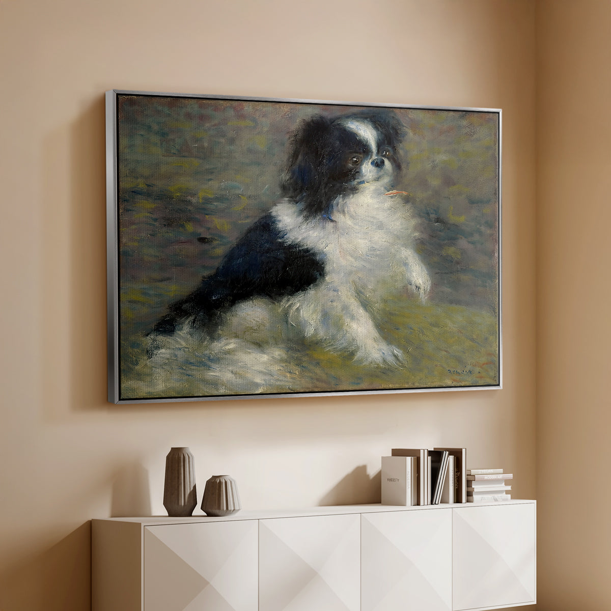 Silver floater framed canvas of Tama, the Japanese Dog, c. 1876 by Pierre-Auguste Renoir, featuring an impressionist painting of a dog wading through water with blurred background above a console cabinet in a minimalist entryway.