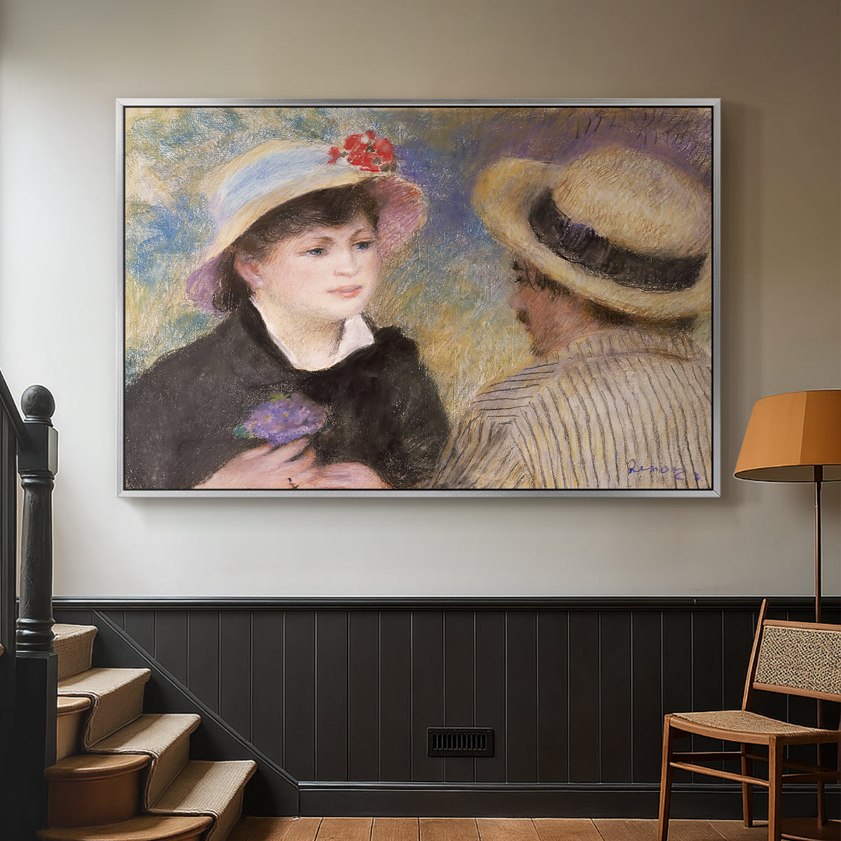 Silver floater framed canvas featuring a romantic scene of two figures in casual conversation with soft light, displayed in a hallway near a staircase.