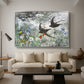 Common Swifts, 1886 by Bruno Liljefors as a silver floater framed canvas featuring a flock of birds in flight soaring across open sky above landscape, displayed above a sofa in a modern living room.