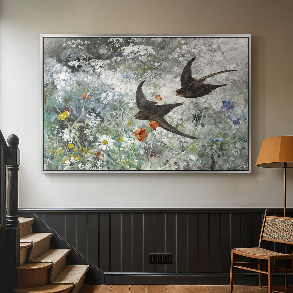 Silver floater framed canvas featuring an impressionist wildlife scene capturing birds in motion, displayed in a hallway near a staircase.