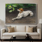 Portrait of a Dog, 1891 by Bruno Liljefors displayed in a silver floater framed canvas above a sofa in a clean living room.
