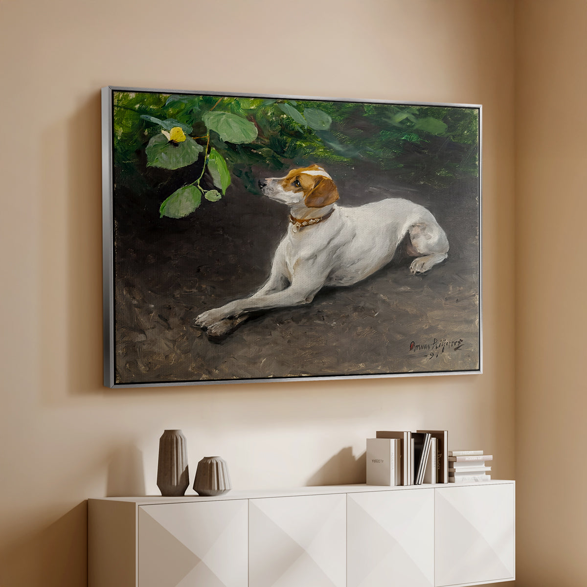 Silver floater framed canvas of Portrait of a Dog, 1891 by Bruno Liljefors, featuring a realistic portrait of a resting dog with attentive expression above a console cabinet in a minimalist entryway.