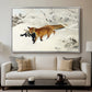 Fox in Snow Landscape, 1900 by Bruno Liljefors displayed in a silver floater framed canvas above a sofa in a clean living room.